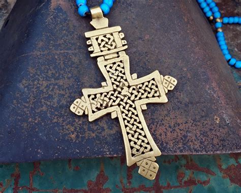 Ethiopian cross necklace - African Ethiopian Coptic Cross Necklace, African Jewelry, Ethnic Tribal Necklace, Large Pendant Amulet Necklace, Handmade Jewelry (12.4k) Sale Price $28.50 $ 28.50 $ 31.67 Original Price $31.67 (10% off) Add to Favorites Silver African cross necklace, Ethiopian coin silver beaded necklace, 20 - 24” extendable unisex necklace for him or her ...